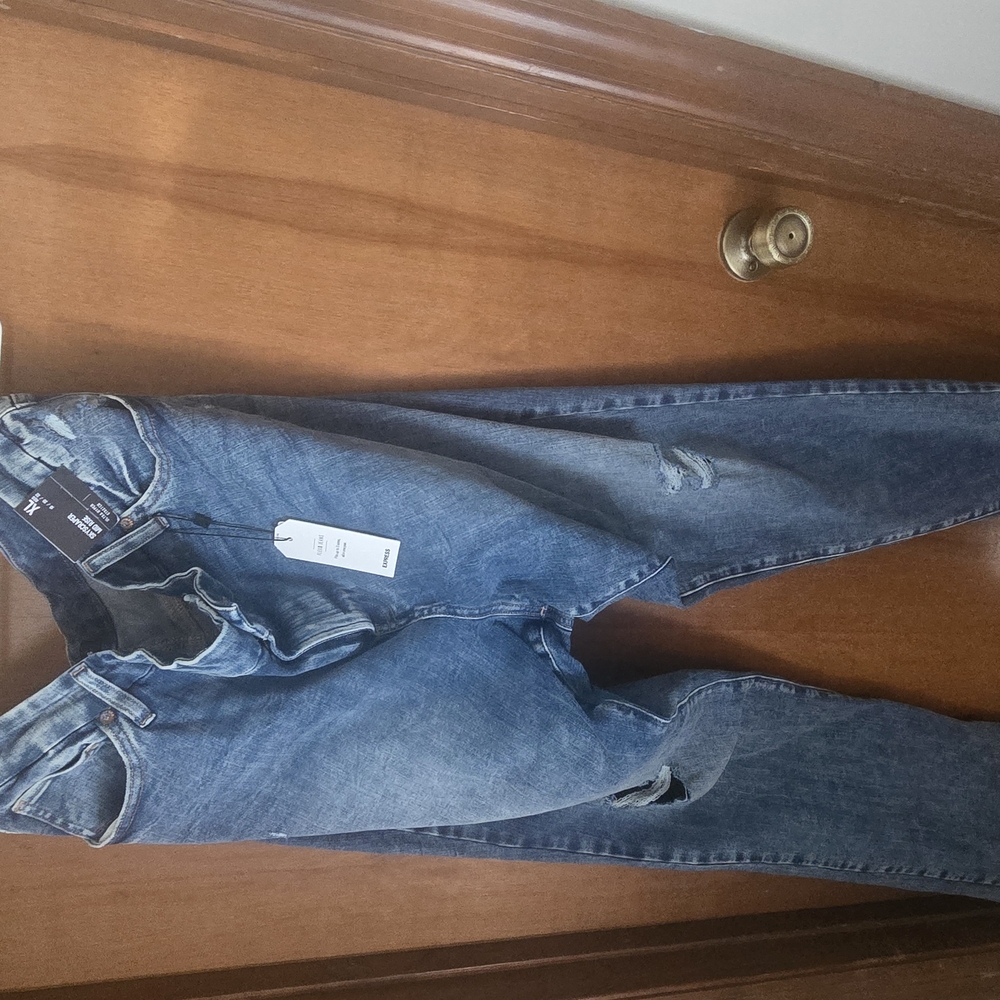 Light Blue Relaxed Fit Distressed Jeans